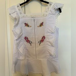 Beautiful white embroidered peplum top